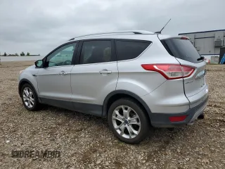 2016 Ford Escape Titanium with VIN 1FMCU9JX2GUC30011, listed as a Copart auction lot 60843315 with 175,549 mi miles and Clean title. Bid and sale history available at DreamBid. Image 2.