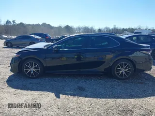 2022 Toyota Camry SE z VIN 4T1G11AK4NU040899, wystawiony jako IAAI lot #41736850 z przebiegiem 64 183 mil mil oraz . Historia ofert i sprzedaży dostępna na DreamBid. Obrazek 14.