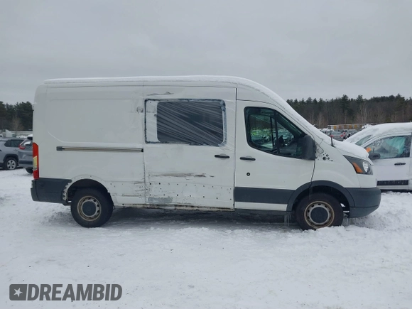 2016 Ford Transit Cargo z VIN 1FTYR2CM2GKA98918, wystawiony jako IAAI lot #41456987 z przebiegiem 51 290 mil mil oraz . Historia ofert i sprzedaży dostępna na DreamBid. Obrazek 13.