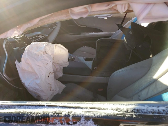 2015 BMW i8 z VIN WBY2Z2C57FV392308, wystawiony jako Copart lot #85937334 z przebiegiem Nie podano mil oraz Szkoda całkowita • Salvage title. Historia ofert i sprzedaży dostępna na DreamBid. Obrazek 7.
