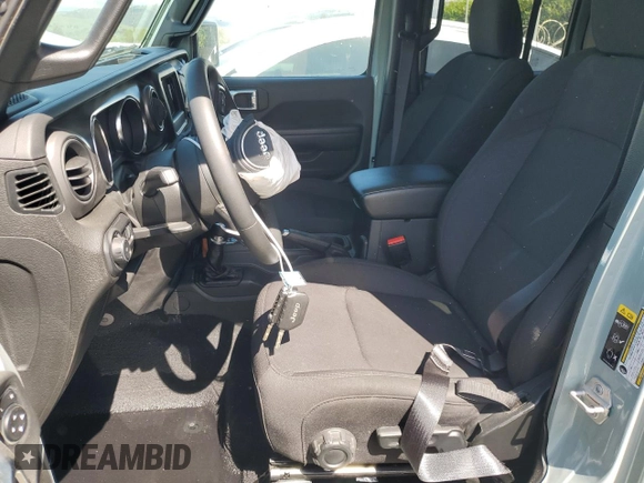 2023 Jeep Wrangler Sport S with VIN 1C4HJXDG5PW623797, listed as a Copart auction lot 50258875 with 16,518 mi miles and Salvage Title. Bid and sale history available at DreamBid. Image 7.