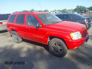 2000 Jeep Grand Cherokee Limited z VIN 1J4GW58N5YC186410, wystawiony jako IAAI lot #42504152 z przebiegiem 140 982 mil mil oraz . Historia ofert i sprzedaży dostępna na DreamBid. Obrazek 1.