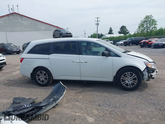 2012 Honda Odyssey EX-L with VIN 5FNRL5H62CB059481, listed as a IAAI auction lot 42241415 with 135,244 mi miles and . Bid and sale history available at DreamBid. Image 13.