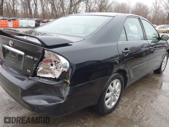 2004 Toyota Camry LE with VIN 4T1BF32K84U074364, listed as a IAAI auction lot 41479264 with 265,865 mi miles. Bid and sale history available at carsss.com. Image 6.