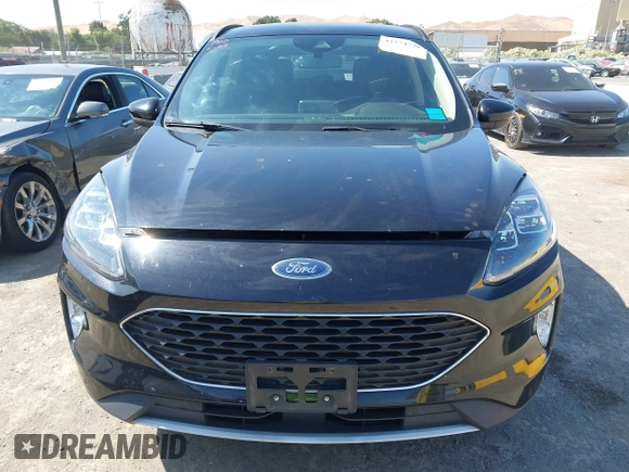 2020 Ford Escape Titanium z VIN 1FMCU9J97LUB18350, wystawiony jako IAAI lot #42574736 z przebiegiem 82 551 mil mil oraz . Historia ofert i sprzedaży dostępna na DreamBid. Obrazek 13.