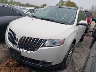 2012 Lincoln MKX with VIN 2LMDJ6JK7CBL11512, listed as a IAAI auction lot 41832419 with 127,485 mi miles. Bid and sale history available at carsss.com. Image 2.