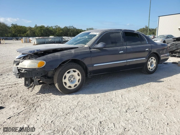 2001 Lincoln Continental with VIN 1LNHM97V21Y680964, listed as a Copart auction lot 80640714 with 0 mi miles and Salvage Title. Bid and sale history available at carsss.com. Image 1.