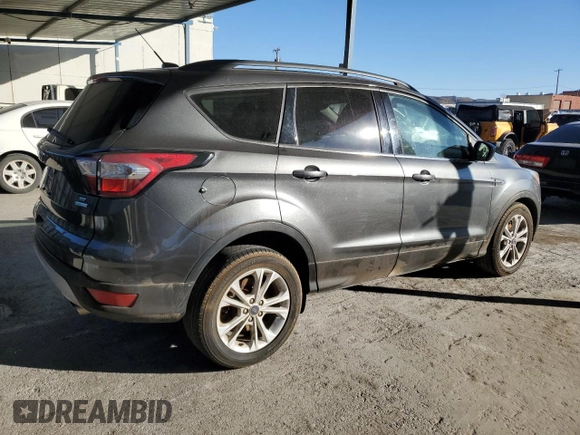 2017 Ford Escape SE with VIN 1FMCU0GD5HUF05252, listed as a Copart auction lot 83610274 with 100,481 mi miles and Clean Title. Bid and sale history available at carsss.com. Image 3.