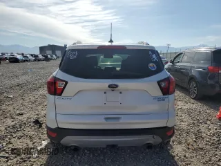 2019 Ford Escape Titanium с VIN 1FMCU9J91KUA35320, выставлен на аукционе Copart как лот 57755525 с пробегом 70 838 миль миль и На запчасти • Non repairable. История ставок и продаж доступна на DreamBid. Изображение 6.