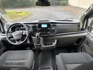 2021 Ford Transit Passenger XL with VIN 1FDAX2C80MKA72528, listed as a Copart auction lot 86920734 with 22,456 mi miles and Salvage Title. Bid and sale history available at DreamBid. Image 9.