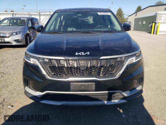 2023 Kia Carnival LX with VIN KNDNB4H32P6237635, listed as a Copart auction lot 76729874 with 26,412 mi miles and Salvage Title. Bid and sale history available at carsss.com. Image 5.