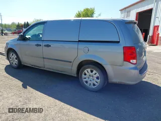 2014 Ram Cargo Van with VIN 2C4RRGAG9ER312915, listed as a IAAI auction lot 41947886 with 149,144 mi miles and . Bid and sale history available at DreamBid. Image 3.