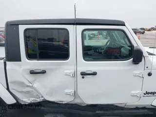 2021 Jeep Gladiator Willys with VIN 1C6HJTAG1ML575474, listed as a IAAI auction lot 41439898 with 44,335 mi miles and . Bid and sale history available at DreamBid. Image 14.