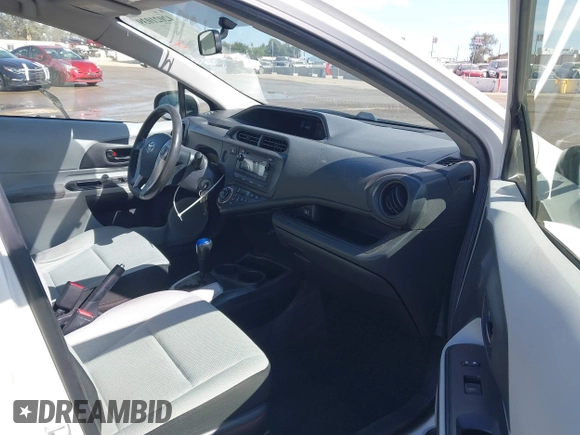 2014 Toyota Prius One with VIN JTDKDTB35E1561818, listed as a IAAI auction lot 42021039 with 184,584 mi miles and . Bid and sale history available at DreamBid. Image 5.