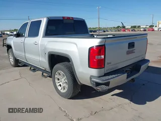 2017 GMC Sierra 1500 SLE with VIN 3GTU2MEC0HG202074, listed as a IAAI auction lot 42067320 with 184,424 mi miles and . Bid and sale history available at DreamBid. Image 3.