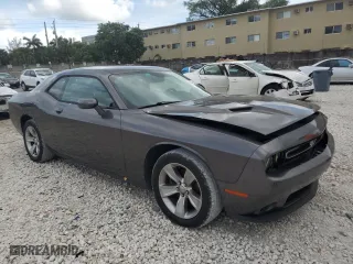 2015 Dodge Challenger SXT with VIN 2C3CDZAG4FH728088, listed as a Copart auction lot 52515645 with 128,104 mi miles and Salvage Title. Bid and sale history available at carsss.com. Image 4.