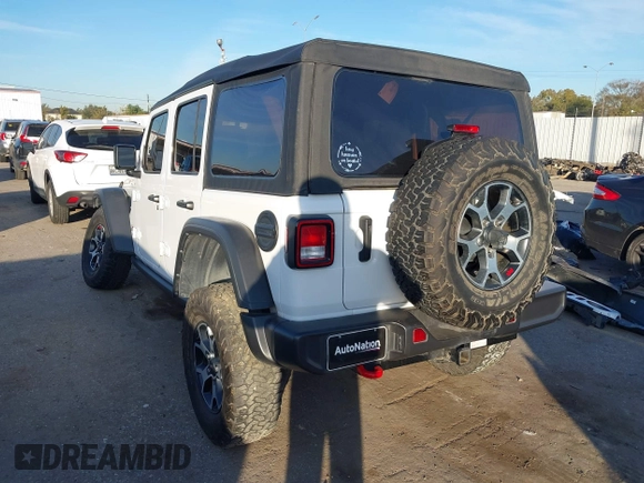 2022 Jeep Wrangler Unlimited Rubicon with VIN 1C4HJXFN4NW123803, listed as a IAAI auction lot 40994742 with 36,156 mi miles and . Bid and sale history available at DreamBid. Image 3.