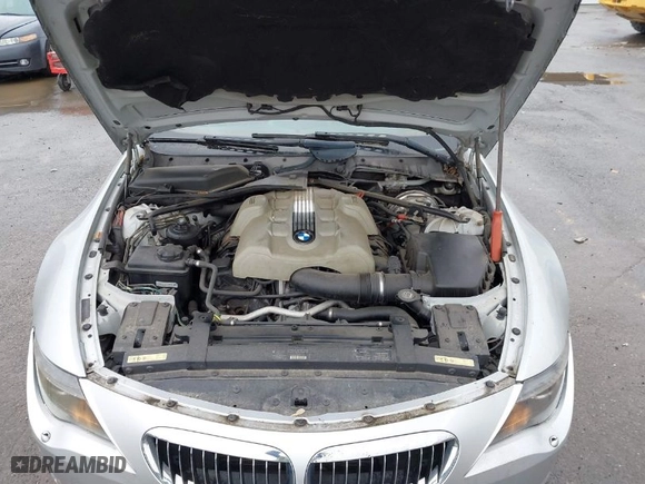 2005 BMW 6 Series 645Ci with VIN WBAEK73475B328662, listed as a IAAI auction lot 41990681 with 135,522 mi miles. Bid and sale history available at carsss.com. Image 10.
