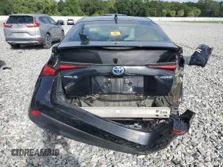 2022 Toyota Prius L Eco с VIN JTDKAMFU7N3179392, выставлен на аукционе Copart как лот 57717725 с пробегом 45 371 миль миль и Списание • Salvage title. История ставок и продаж доступна на DreamBid. Изображение 6.