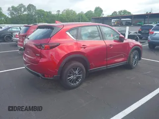 2019 Mazda CX-5 Sport with VIN JM3KFABM5K0627087, listed as a IAAI auction lot 42163866 with 38,050 mi miles and . Bid and sale history available at DreamBid. Image 4.