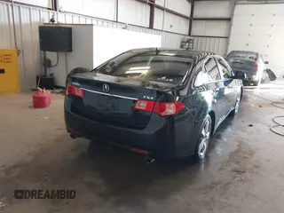 2014 Acura TSX with VIN JH4CU2F42EC005762, listed as a IAAI auction lot 41318591 with 142,934 mi miles and . Bid and sale history available at DreamBid. Image 4.