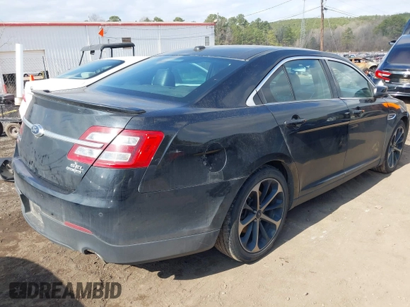 2014 Ford Taurus SEL with VIN 1FAHP2E81EG122928, listed as a IAAI auction lot 41492582 with 200,411 mi miles. Bid and sale history available at carsss.com. Image 4.