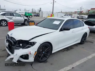 2021 BMW 3 Series 330i z VIN 3MW5R1J04M8C06043, wystawiony jako IAAI lot #42109872 z przebiegiem 62 325 mil mil oraz . Historia ofert i sprzedaży dostępna na DreamBid. Obrazek 2.