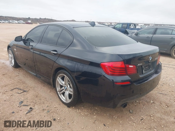 2014 BMW 5 Series 535i xDrive with VIN WBA5B3C58ED531677, listed as a IAAI auction lot 41684139 with 132,560 mi miles and . Bid and sale history available at carsss.com. Image 3.