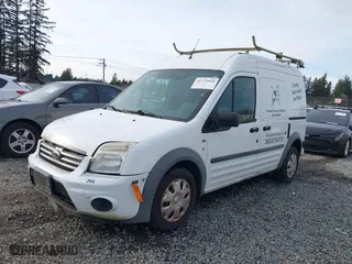 2012 Ford Transit Connect XLT with VIN NM0LS7DN2CT106410, listed as a IAAI auction lot 41753928 with 127,352 mi miles. Bid and sale history available at carsss.com. Image 17.
