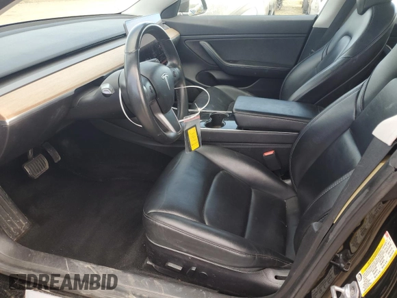 2019 Tesla Model 3 Long Range with VIN 5YJ3E1EB1KF212019, listed as a Copart auction lot 50134385 with 83,478 mi miles and Salvage Title. Bid and sale history available at DreamBid. Image 7.