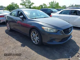 2014 Mazda 6 i Touring with VIN JM1GJ1V6XE1148687, listed as a IAAI auction lot 42544713 with 162,972 mi miles and . Bid and sale history available at DreamBid. Image 1.