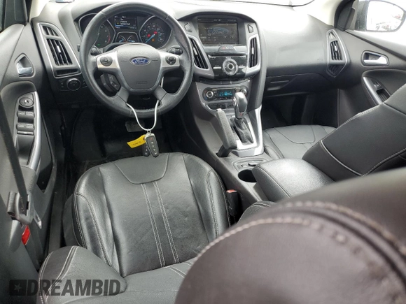 2014 Ford Focus Titanium with VIN 1FADP3N20EL329415, listed as a Copart auction lot 60881115 with 97,382 mi miles and Salvage title. Bid and sale history available at DreamBid. Image 8.