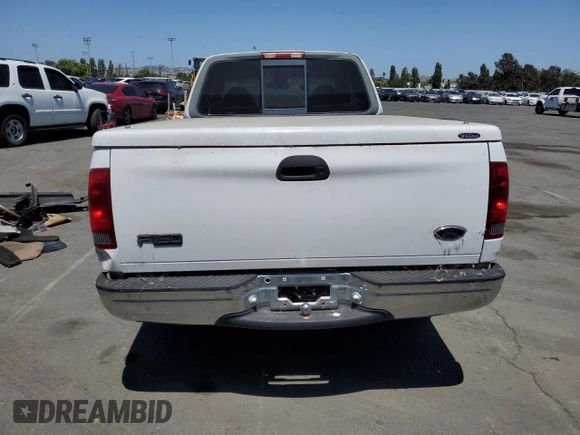 2000 Ford F-150 XL with VIN 1FTRX17W9YKA49152, listed as a Copart auction lot 60577505 with Not provided miles and Salvage title. Bid and sale history available at DreamBid. Image 6.