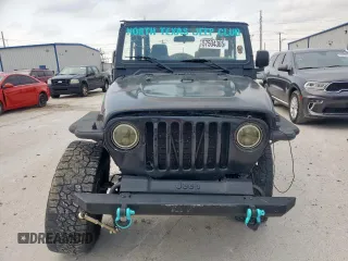 2005 Jeep Wrangler X with VIN 1J4FA39S25P367360, listed as a Copart auction lot 57504365 with 112,125 mi miles and Salvage title. Bid and sale history available at DreamBid. Image 5.