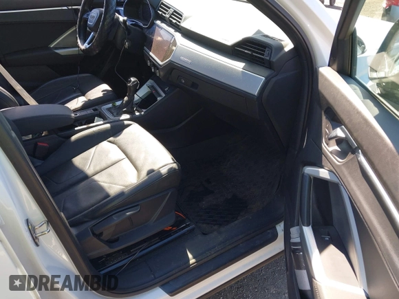 2019 Audi Q3 Premium with VIN WA1AECF37K1077089, listed as a IAAI auction lot 41742732 with 61,038 mi miles and . Bid and sale history available at DreamBid. Image 5.