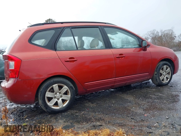 2007 Kia Rondo LX Base with VIN KNAFG525077087912, listed as a IAAI auction lot 41032154 with 109,141 mi miles. Bid and sale history available at carsss.com. Image 4.
