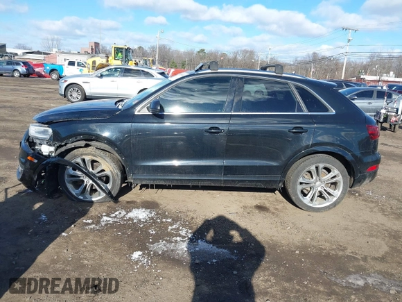 2015 Audi Q3 Prestige with VIN WA1GFCFS4FR004025, listed as a IAAI auction lot 41286031 with 103,132 mi miles and . Bid and sale history available at DreamBid. Image 14.