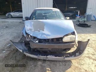 1996 Geo Prizm z VIN 1Y1SK5261TZ027723, wystawiony jako Copart lot #46788525 z przebiegiem 235 361 mil mil oraz Szkody całkowita. Historia ofert i sprzedaży dostępna na DreamBid. Obrazek 5.