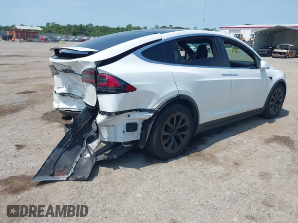 2016 Tesla Model X 70D z VIN 5YJXCBE25GF029372, wystawiony jako IAAI lot #42325335 z przebiegiem 80 071 mil mil oraz . Historia ofert i sprzedaży dostępna na DreamBid. Obrazek 4.