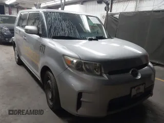 2012 Scion xB with VIN JTLZE4FE5CJ028608, listed as a IAAI auction lot 41916318 with 233,007 mi miles. Bid and sale history available at carsss.com. Image 1.