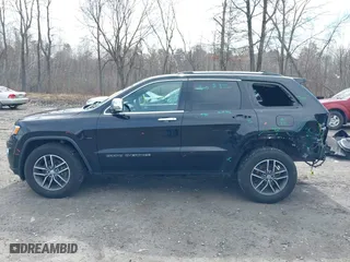 2018 Jeep Grand Cherokee Limited with VIN 1C4RJFBG9JC427825, listed as a IAAI auction lot 42028430 with 111,714 mi miles. Bid and sale history available at carsss.com. Image 14.