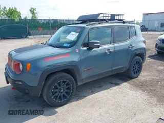 2016 Jeep Renegade Trailhawk with VIN ZACCJBCTXGPD99550, listed as a IAAI auction lot 42446773 with 174,283 mi miles and . Bid and sale history available at DreamBid. Image 2.