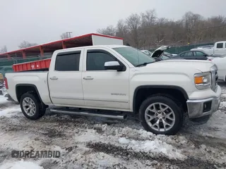 2015 GMC Sierra 1500 SLT with VIN 3GTU2VEC8FG160370, listed as a IAAI auction lot 41532702 with 112,129 mi miles and . Bid and sale history available at DreamBid. Image 13.
