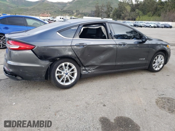 2019 Ford Fusion Hybrid SE with VIN 3FA6P0LU1KR200155, listed as a Copart auction lot 42598013 with 61,762 mi miles. Bid and sale history available at carsss.com. Image 3.