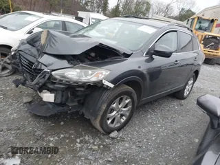2013 Mazda CX-9 Touring with VIN JM3TB2CV6D0410888, listed as a IAAI auction lot 41688789 with 135,291 mi miles and . Bid and sale history available at carsss.com. Image 2.