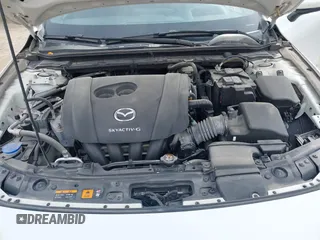 2021 Mazda 3 Premium with VIN JM1BPAML0M1302385, listed as a IAAI auction lot 41397521 with 55,907 mi miles and . Bid and sale history available at DreamBid. Image 10.