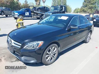 2015 Mercedes-Benz C 300 Luxury with VIN 55SWF4KB2FU047571, listed as a IAAI auction lot 42201288 with 124,678 mi miles and . Bid and sale history available at carsss.com. Image 6.