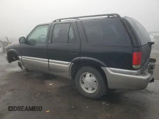 1998 GMC Jimmy SL with VIN 1GKCS13W8W2572514, listed as a Copart auction lot 83016224 with 85,044 mi miles and Salvage Title. Bid and sale history available at carsss.com. Image 2.