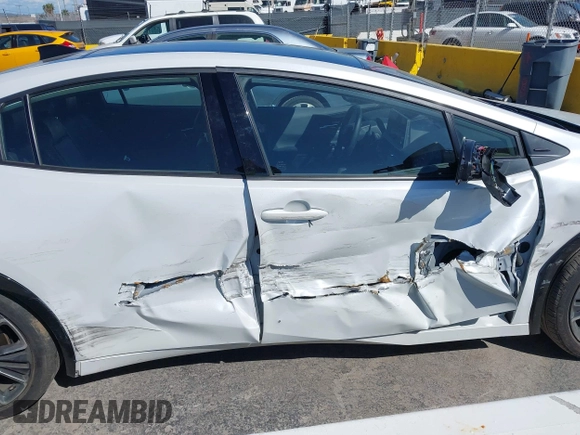 2023 Toyota Prius LE with VIN JTDACAAUXP3012538, listed as a IAAI auction lot 41948103 with 33,338 mi miles and . Bid and sale history available at DreamBid. Image 13.