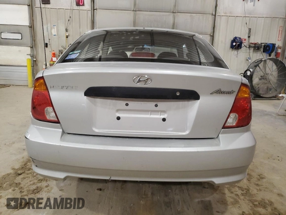 2004 Hyundai Accent with VIN KMHCF35C34U311951, listed as a Copart auction lot 45960045 with 171,902 mi miles and Clean Title. Bid and sale history available at carsss.com. Image 6.